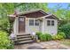 Inviting home with well-manicured front yard and a cozy, classic facade at 677 Holmes Nw St, Atlanta, GA 30318