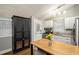 Well-lit kitchen featuring modern appliances, light countertops, and stylish lighting at 677 Holmes Nw St, Atlanta, GA 30318