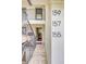 Townhome entrance showing staircase and doors to units 155, 157, and 159 at 157 Maribeau Nw Sq, Atlanta, GA 30327