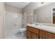 A full bathroom with tile flooring, shower-tub combo, and traditional vanity at 2105 Country Park Se Dr, Smyrna, GA 30080