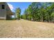 Expansive backyard provides endless possibilities for outdoor activities and enjoyment of nature's beauty at 2749 Porches Ln, Dacula, GA 30019