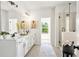 Elegant bathroom with double sinks, white cabinets, and a glass-enclosed shower at 2749 Porches Ln, Dacula, GA 30019