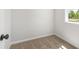 A carpeted room with one window allowing natural light to enter, creating a bright space at 2749 Porches Ln, Dacula, GA 30019