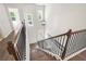 Spacious staircase leading to the entry with modern railings at 2749 Porches Ln, Dacula, GA 30019