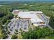 Aerial view of Harrison High School showcasing its extensive facilities and parking areas at 390 Scott Farm Dr, Powder Springs, GA 30127