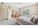 Comfortable bedroom boasts natural light from the window and a neutral color palette, creating a relaxing atmosphere at 390 Scott Farm Dr, Powder Springs, GA 30127