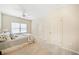 This bedroom has carpeted floors, ceiling fan, and closet doors at 390 Scott Farm Dr, Powder Springs, GA 30127