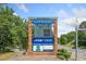 Electronic Community sign for Harrison High School, promoting school sponsors and events at 390 Scott Farm Dr, Powder Springs, GA 30127