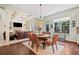 Open concept dining area featuring coffered ceilings and access to a living space and a backyard at 390 Scott Farm Dr, Powder Springs, GA 30127