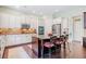 Spacious kitchen with a center island and stainless steel appliances and seating for four at 390 Scott Farm Dr, Powder Springs, GA 30127