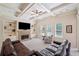 Comfortable living room with built-in shelving, stone fireplace, and ample natural light from large windows at 390 Scott Farm Dr, Powder Springs, GA 30127