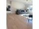 Spacious living room features a ceiling fan, recessed lighting, and hardwood floors at 4010 Sierra Knolls Ct, Cumming, GA 30040