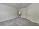 Spacious bedroom with neutral walls, carpet flooring, and natural light at 4050 Sierra Vista Cir, Cumming, GA 30040