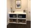 Stylish entryway featuring a console table with storage and modern decor, creating a welcoming ambiance at 4050 Sierra Vista Cir, Cumming, GA 30040