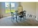 Versatile game room with a large window offering backyard views and ample space for entertainment at 4050 Sierra Vista Cir, Cumming, GA 30040
