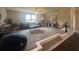 Carpeted living room with a comfortable seating area and a large window at 4050 Sierra Vista Cir, Cumming, GA 30040