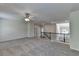 Spacious loft featuring neutral paint, plush carpeting and a modern ceiling fan at 4050 Sierra Vista Cir, Cumming, GA 30040