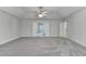 Spacious bedroom featuring tray ceilings, carpet flooring, and abundant natural light at 4050 Sierra Vista Cir, Cumming, GA 30040