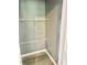 Walk-in closet with new shelving for easy organization and access to clothing at 201 Deerfield Ln, Carrollton, GA 30116