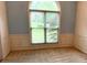 Well-lit dining room with trim detail and a large window at 300 Gaelic Way, Tyrone, GA 30290