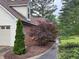 Well-maintained exterior with a combination of siding, brick and nice landscaping at 300 Gaelic Way, Tyrone, GA 30290