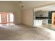 Bright and open living room and kitchen area with great lighting and plenty of space at 300 Gaelic Way, Tyrone, GA 30290