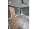 Updated bedroom with modern colors, trim, and light hardwood flooring at 312 Archway Ln, Peachtree City, GA 30269