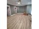 Large bedroom with light wood flooring and modern trim at 312 Archway Ln, Peachtree City, GA 30269