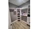Well-organized closet with built-in shelving for storage and organization at 312 Archway Ln, Peachtree City, GA 30269