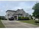 Large single Gathering house on a large lot with manicured front yard at 312 Archway Ln, Peachtree City, GA 30269