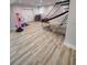 Spacious game room with a punching bag and basketball hoop at 312 Archway Ln, Peachtree City, GA 30269