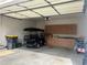 Spacious garage with cabinets, golf cart, and plenty of storage space at 312 Archway Ln, Peachtree City, GA 30269