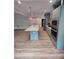 Kitchen with modern stainless steel appliances, island, and custom cabinetry at 312 Archway Ln, Peachtree City, GA 30269