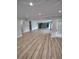 Open concept living space features recessed lighting, hard wood floors, and seamless flow at 312 Archway Ln, Peachtree City, GA 30269