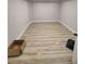Empty room with light wood floors and white trim at 312 Archway Ln, Peachtree City, GA 30269