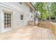 Spacious wooden deck provides outdoor enjoyment and views of the backyard at 4367 Cedar Wood Sw Dr, Lilburn, GA 30047