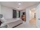 Comfortable bedroom with natural light, soft carpet, and direct access to hallway at 4367 Cedar Wood Sw Dr, Lilburn, GA 30047