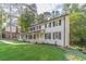 Beautifully landscaped front yard enhances the curb appeal of this well-maintained two-story home at 4367 Cedar Wood Sw Dr, Lilburn, GA 30047