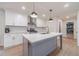 Stylish kitchen with quartz countertops, stainless appliances, and center island at 4367 Cedar Wood Sw Dr, Lilburn, GA 30047