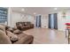 Spacious living room with updated flooring and contemporary decorations at 4367 Cedar Wood Sw Dr, Lilburn, GA 30047