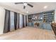 Inviting living room showcases a decorative brick fireplace and built-in shelving at 4367 Cedar Wood Sw Dr, Lilburn, GA 30047
