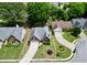 Charming home with lush landscaping, a double driveway, and a well-maintained lawn in a serene neighborhood at 4730 Fairway View Ct, Duluth, GA 30096