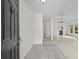 Welcoming foyer with tile flooring leading to a bright, open living area at 4730 Fairway View Ct, Duluth, GA 30096