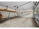 Spacious garage featuring an organization shelf and plenty of room at 4730 Fairway View Ct, Duluth, GA 30096
