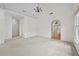 Large open-concept living room with vaulted ceilings and stylish lighting at 4730 Fairway View Ct, Duluth, GA 30096