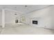Spacious living room featuring a fireplace, vaulted ceilings, and natural light at 4730 Fairway View Ct, Duluth, GA 30096