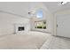 Bright living area boasting a fireplace, vaulted ceilings, and large windows at 4730 Fairway View Ct, Duluth, GA 30096