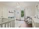 Bright ' bedroom with hardwood floors, decor, and a ceiling fan at 946 Cornwall Sw Ct, Marietta, GA 30064