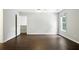 Spacious bedroom featuring hardwood floors, natural light, and a neutral color palette at 946 Cornwall Sw Ct, Marietta, GA 30064