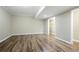 Empty bedroom featuring hardwood floors, a closet, and neutral walls at 946 Cornwall Sw Ct, Marietta, GA 30064